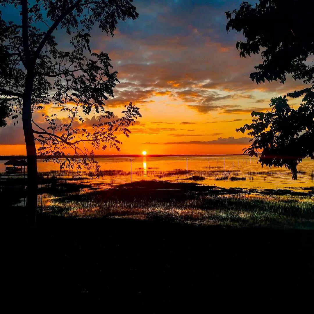 Sunset over the lake Petén Itza, El Remate, Guatemala.  px