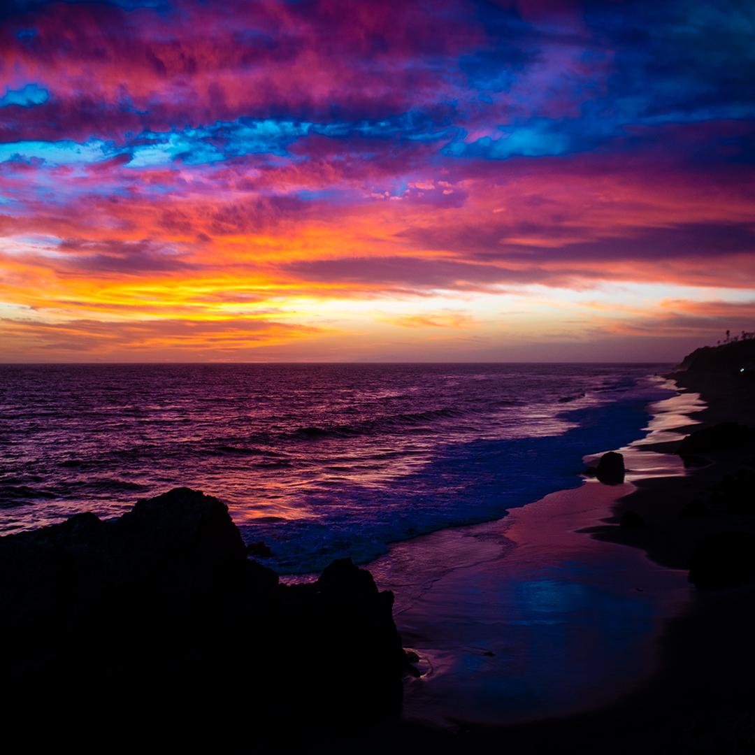 The colorful sunset of Zuma, CA / www.fernandezfotos.com