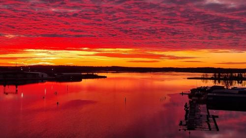 Fiery skies over calm waters