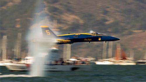 Fleet Week 2005. Blue Angels 5 making a low / high speed pass over the San Francisco bay creating a spectacular effect.
