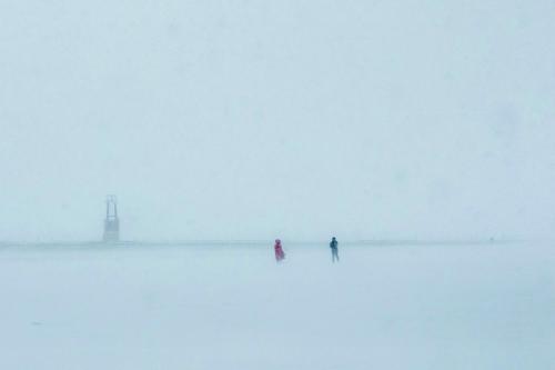 A couple in a snowstorm