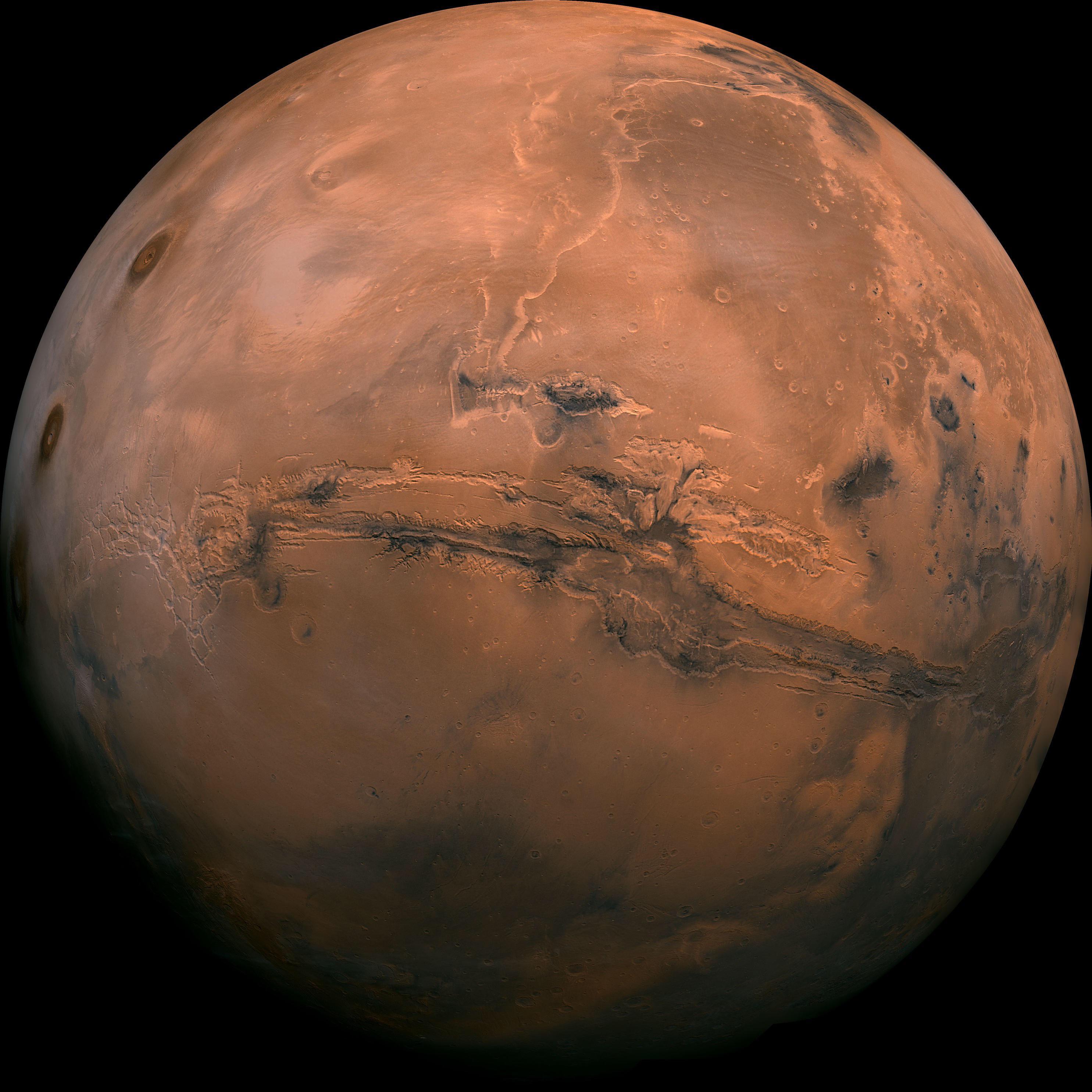 Clearest picture of mars ever! Those canyons  are the deepest and longest in our solar system.