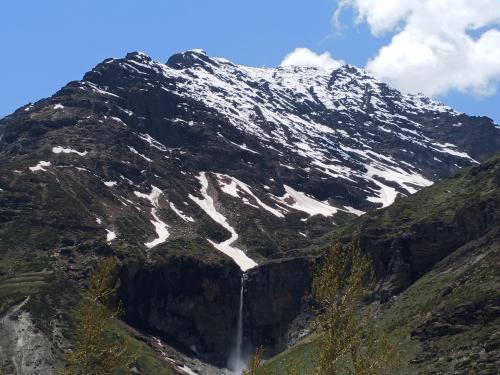 A waterfall coming down from snowey mountain of himalaya in himanchal pradesh