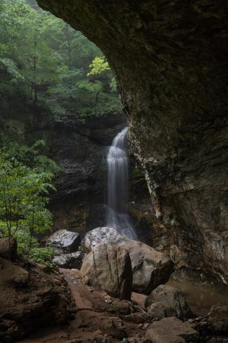 Watching a waterfall from inside a huge cave is a great Ozarkian experience. Lost Valley, Arkansas