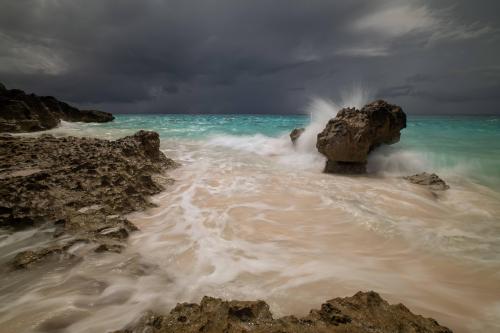 A storm rolls in on a Bermuda beach.