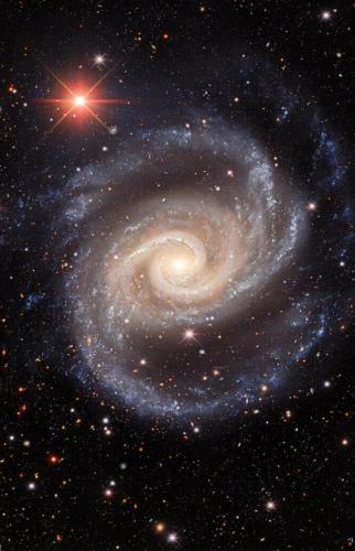 -Twirl throwing his arms across the vastness of space: the Spanish dancer - Located in the constellation of Dorado and located approximately 70 million light-years away, NGC 1566 is a grandly designed spiral galaxy..