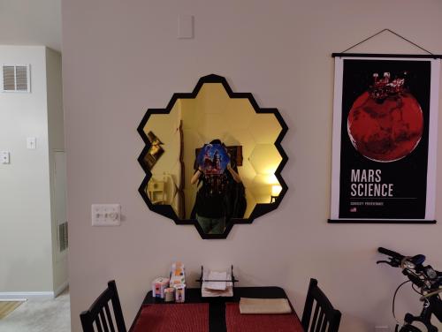 After being inspired by another reddit post, I decided to make my own Webb Mirror wall decoration! After 17 days of work, it's done, and I couldn't be happier! And yes, the picture in the center is attached via magnets for easy replacement.