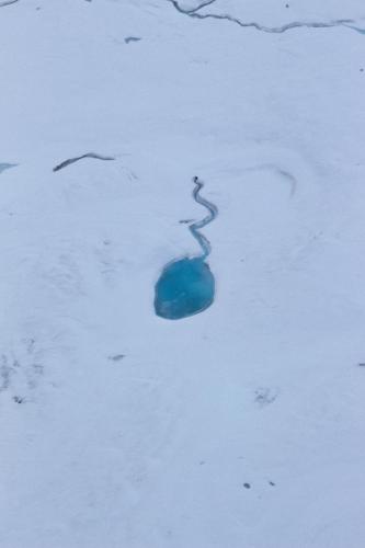 Small glacial lake, Denali Alaska looking for a "Moulin in a Glacier, Switzerland"