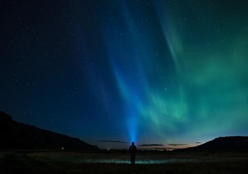 Person standing northern light aurora  by r3dmax