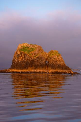 Heart shaped rock at sunset for Valentines. Off the west coast of Vancouver Island, BC