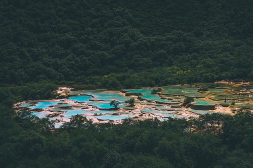 World's biggest group of colorful calcified ponds in Huanglong, Sichuan, China