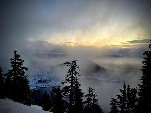 A stormy sunrise at Crater Lake  OC