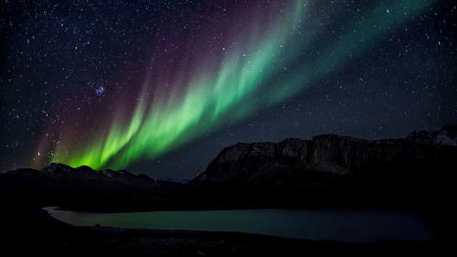 northern lights starry sky mountains