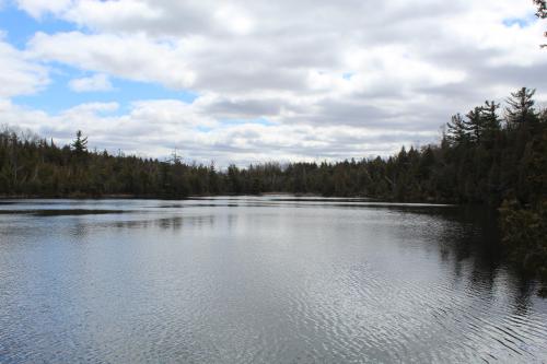 Crawford Lake is a meromictic lake located in Halton Hills, Ontario. Analysis of the lake's sediments indicated the presence of corn pollen, leading to the archaeological discovery of 11 nearby Iroquoian longhouses dating from the fifteenth century AD