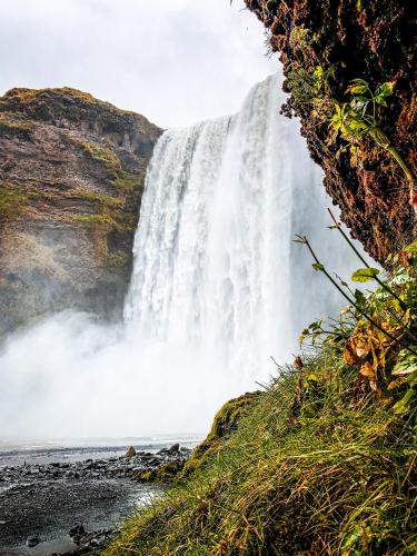 Skógafoss is a waterfall on the Skógá River in the south of Iceland at the cliff marking the former coastline.