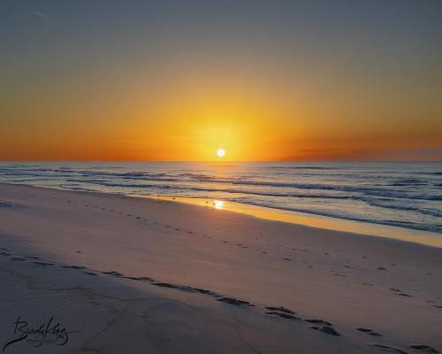 I shot this a few weeks ago on Navarre Beach Florida. I call it "Morning Sunburst". I hope you enjoy.