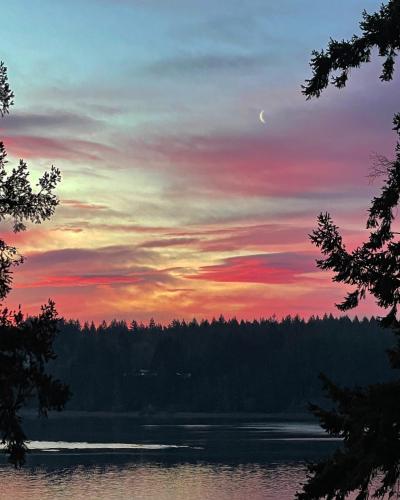 Crescent moon against a fiery sunrise   [Washington, US]