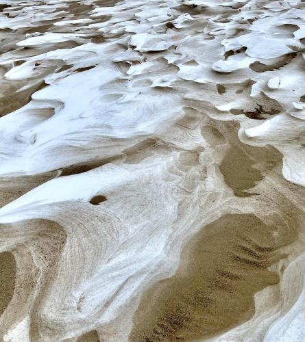 A frozen beach on Lake Michigan on the Southside of Chicago, IL  [1865x2097]