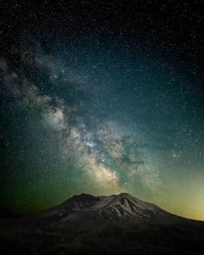 The Milky Way behind the maw of Mt St Helen's enormous crater