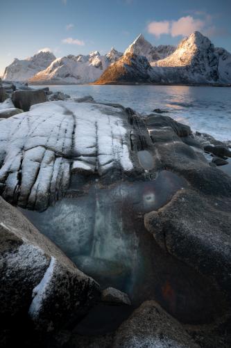 Frozen puddles along the coast in Lofoten, Norway