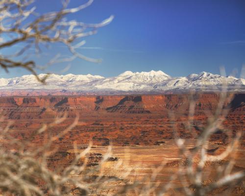 Utah valley overview in canyon lands NP and snow capped mountains