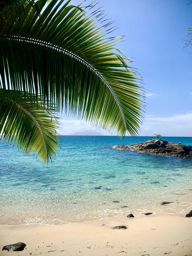 Silhouette Island as seen from the Hilton Northolme’s private beach on Mahé, Seychelles