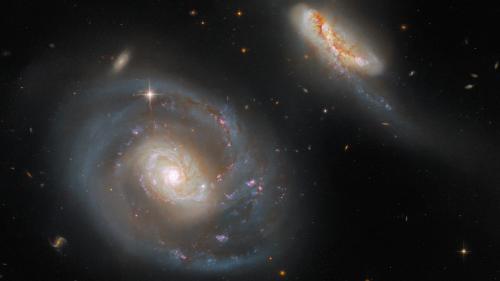 Hubble: Peculiar galactic pair.