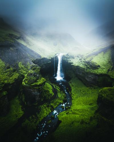 Hidden in a green setting, Kvernufoss, Iceland.