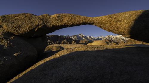 Gorgeous morning light on the Sierras as seen from Lathe Arch, Alabama Hills CA