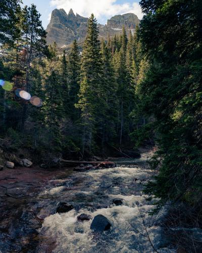 A raging river in Glacier National Park, Montana, USA