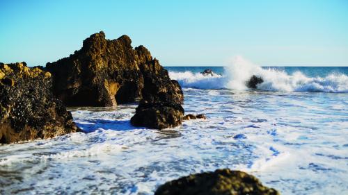 Waves crashing down by Malibu, CA.
