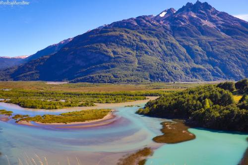 View of the Ibáñez River from Mirador Confluencia, Chile. The incredible blue color comes from minerals released by the glacier that feeds the river.