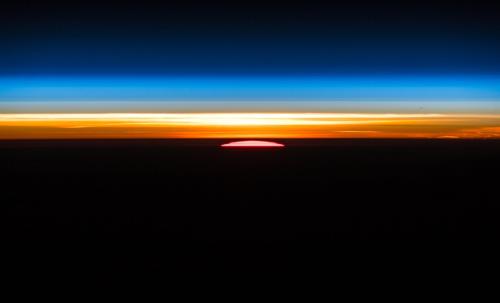"I don't know any words, in any language, to match the beauty of an orbital sunrise," writes European Space Agency  Astronaut Alexander Gerst on October 5, 2018. This photograph of Earth was taken from the International Space Station.
