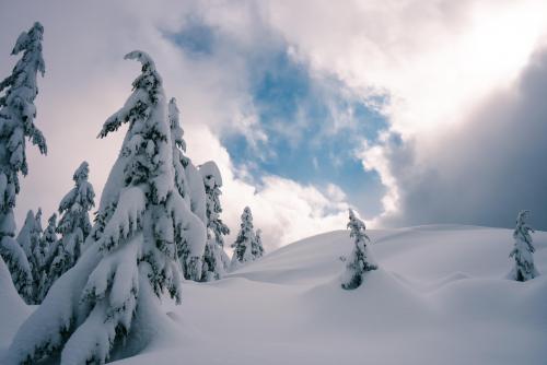 Clouds breaking after some heavy snowfall outside of Vancouver, BC