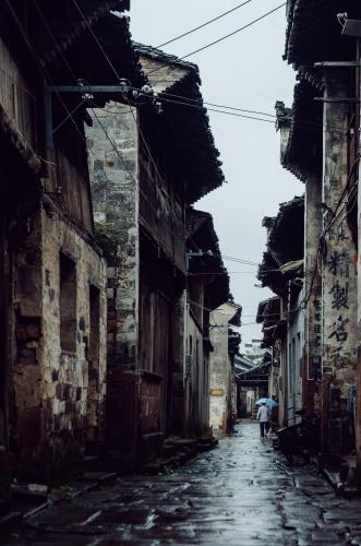 There was no tourism development in this street at that time, and mottled texts were written on the walls  2014 XiuNing HuangShan Anhui China