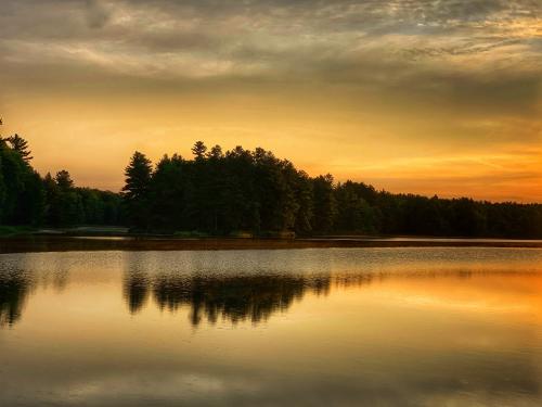 Morning glow on Big Salmon Lake, Ontario, Canada.