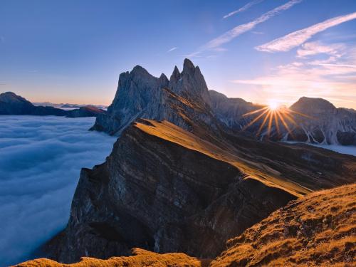 I climbed above a sea of clouds to catch the sunrise, Dolomites, Italy