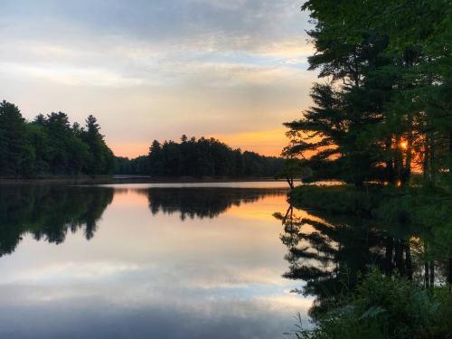 Morning reflections on Big Salmon Lake, South Frontenac, Ontario Canada