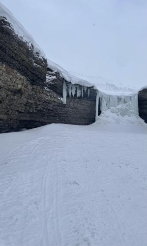 The frozen Eskerfossen — a magnificent waterfall in Svalbard, Norway