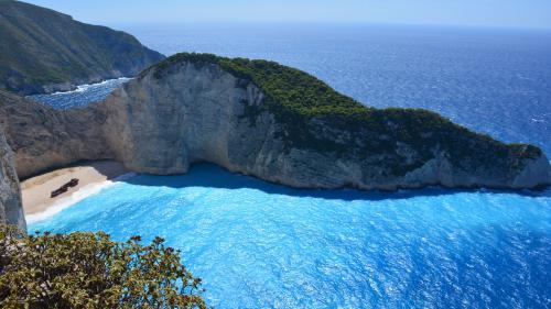 Green Island Near the Ocean during Daytime