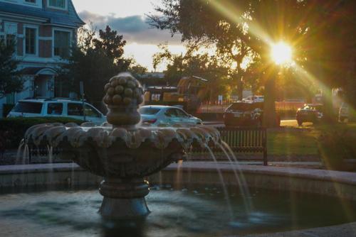 Sunrays on a water fountain