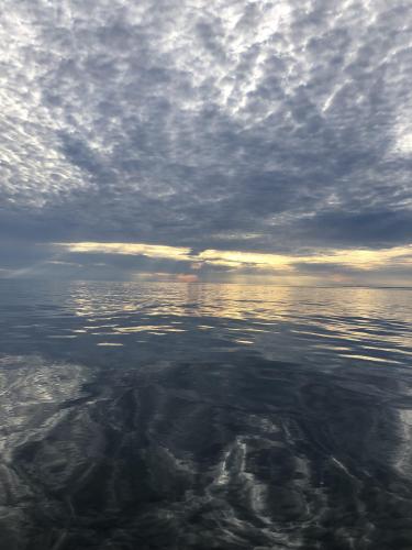 A rare calm evening on lake Erie where the lake meets the sky