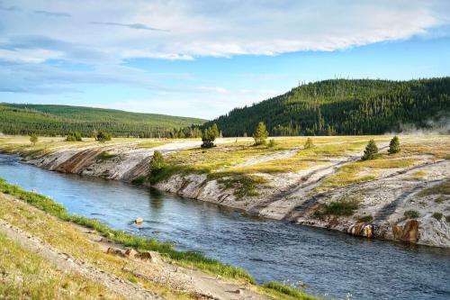 The Firehole River in Yellowstone, where hot springs mix in with the cool water