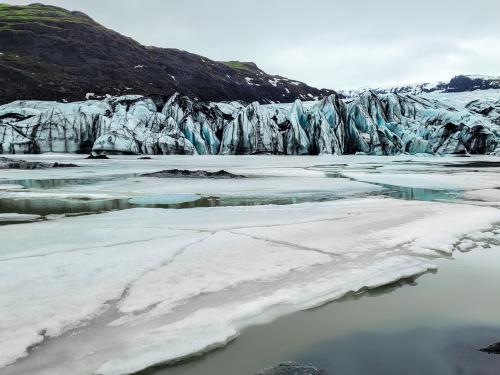 Tongue of the glacier Solheimjökull , where volcanic ash is frozen into the ice