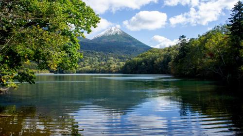 First snow of the season up on Mount Akan-Fuji, Hokkaido, Japan.