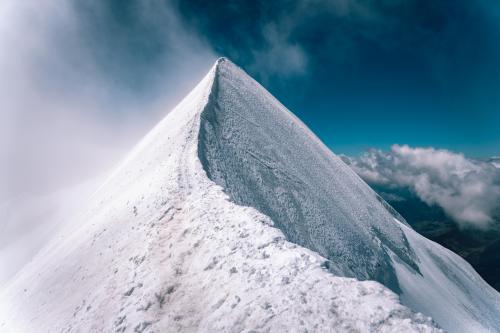 Mountain ridge of Castor summit  in the alps.