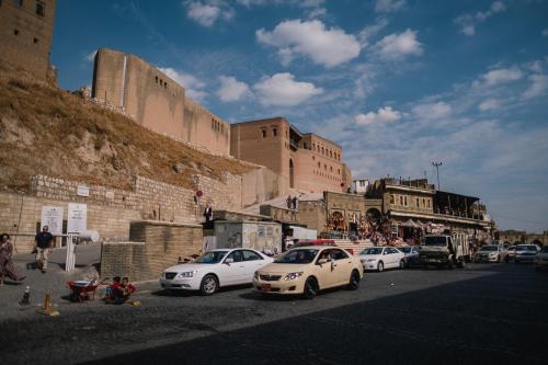The ancient walls of the Citadel of Erbil, the oldest continuously inhabited place on earth, loom over the bustling city below