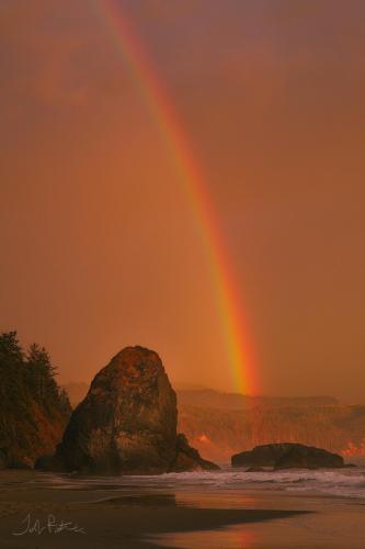 Rainbow at sunset in Port Oxford, Oregon {OC}