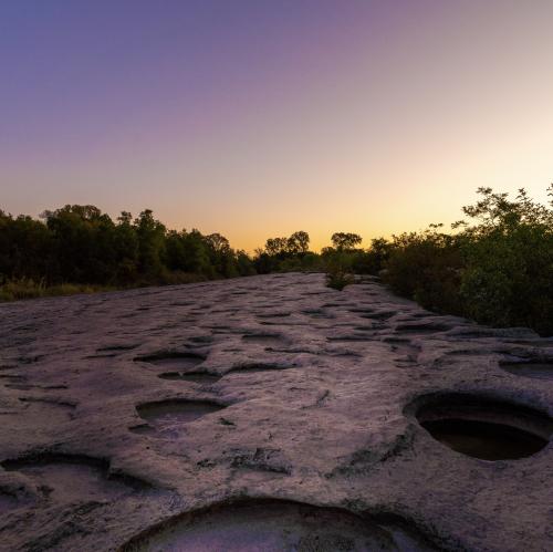 McKinney Falls in Austin, TX at daybreak. The sky and reflection on the rocks almost looks fake. 6336 × 6336