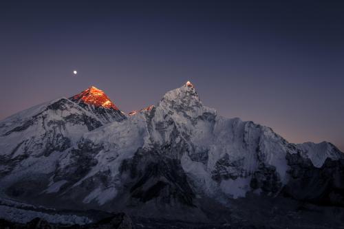 Sunset and moon rising behind Mt Everest, Lhotse and Nuptse, seen from Kalapatthar